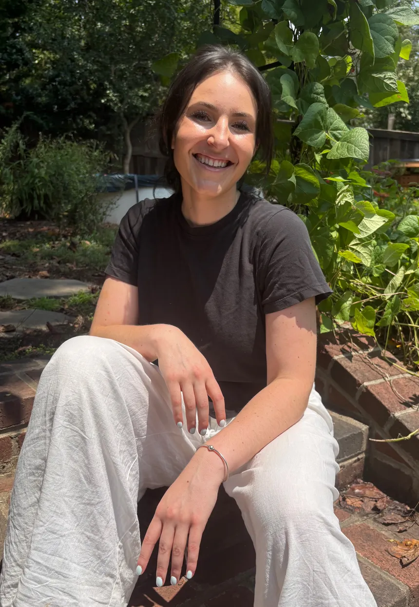Becca Gilbert smiling outdoors